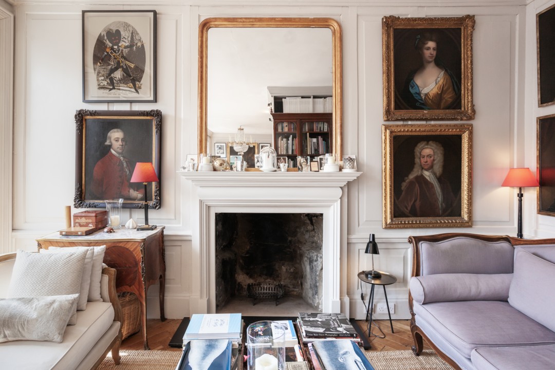 room with two sofas and fireplace