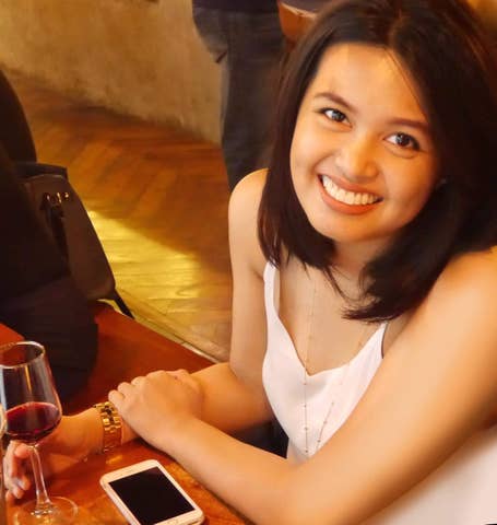 lady named Mich holding glass of wine